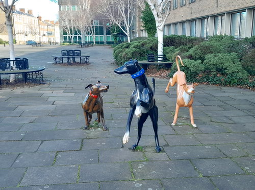 Racing Ahead Dog Sculptures